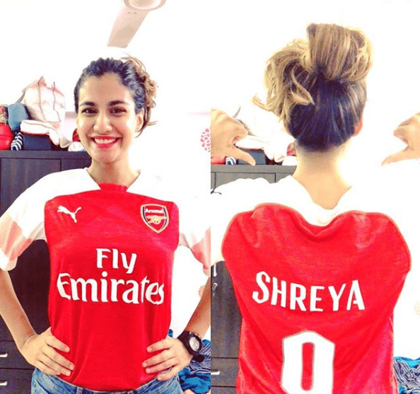 Shreya Dhanwanthary in red shirt