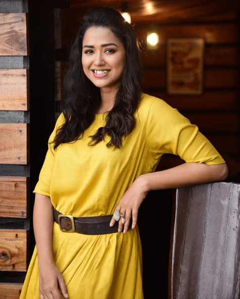 Sohini Sarkar in yellow dress