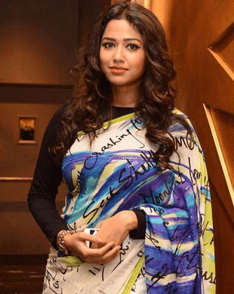 Sohini Sarkar in blue dress