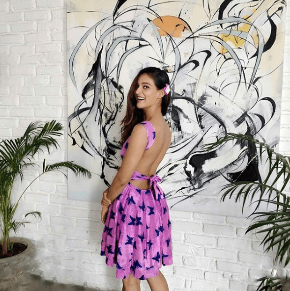 Mukti Mohan in purple